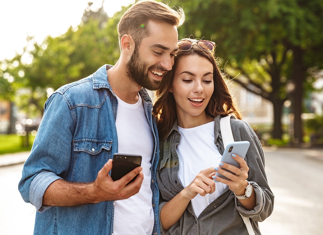 Read Our Reviews - Young Couple Spending Time Together Outside on a Sunny Day